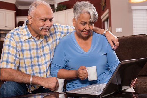 Photograph of a couple reviewing a medical document