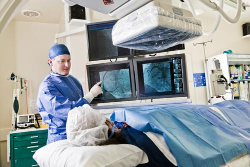 Interventional radiologist performing an angiography exam