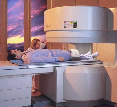 Magnetic Resonance Imaging (MRI) equipment. This is an example of an open MRI machine. Open MRI machines are designed to alleviate patient claustrophobia. 