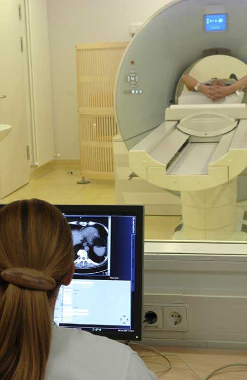 Patient undergoing a Computed Tomography (CT) exam.
