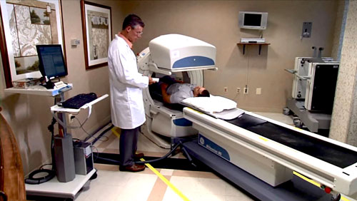Photograph of a patient during a nuclear medicine procedure.