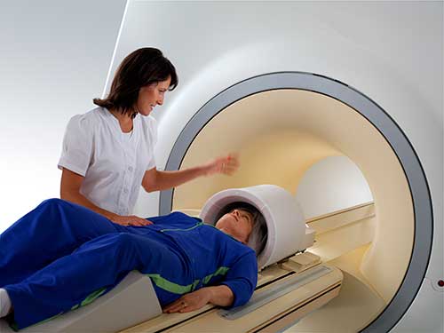 Patient being prepped for a magnetic resonance imaging (MRI) exam.