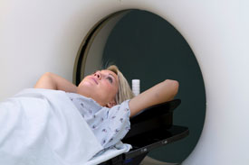 Patient entering the CT scanner.